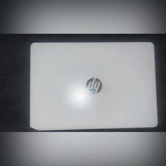 HP Silver Laptop with Black and Red Accessories